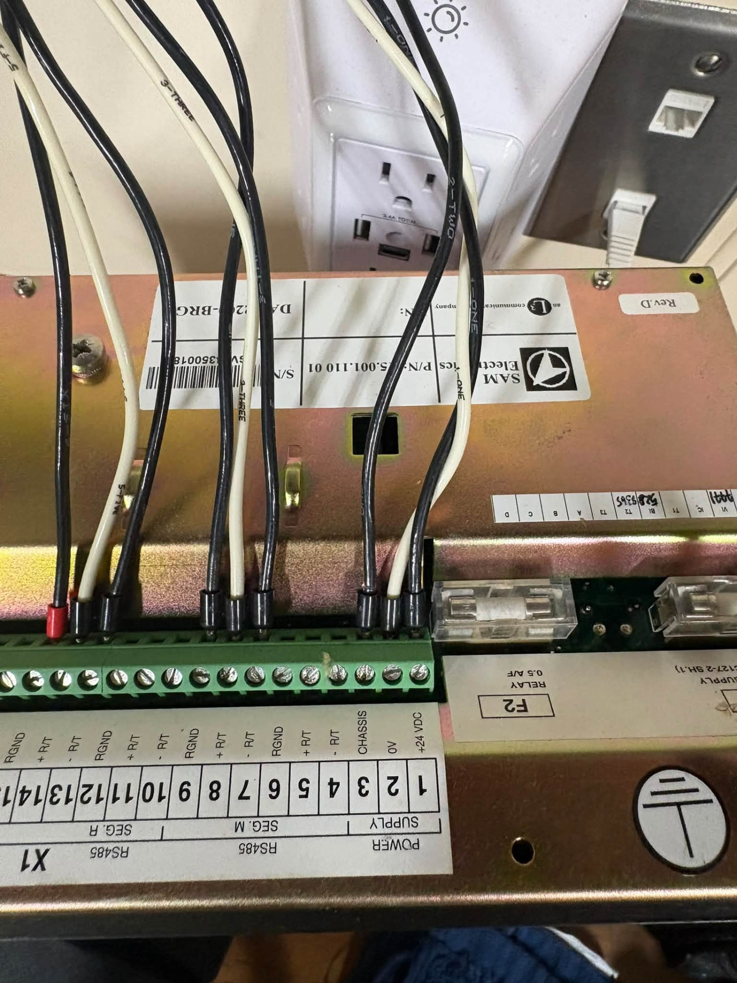 Control wiring terminated on numbered terminal strips in a marine electronics cabinet